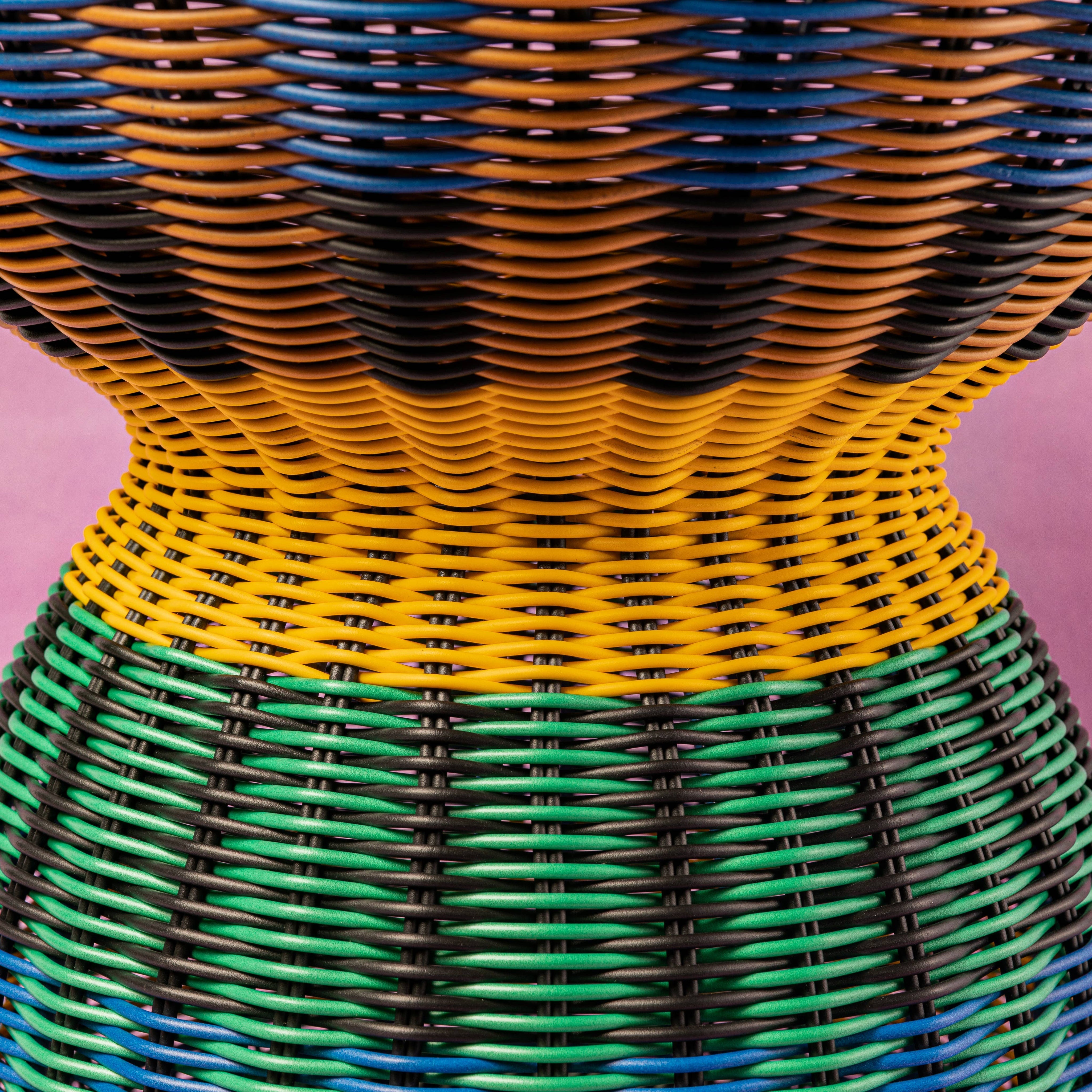 Blue and yellow woven accent table, further view