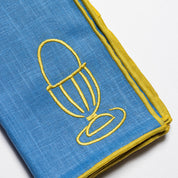 Egg napkins styled on a breakfast table