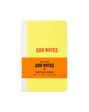 Notebook with 'Odd Notes' text on a yellow and orange cover