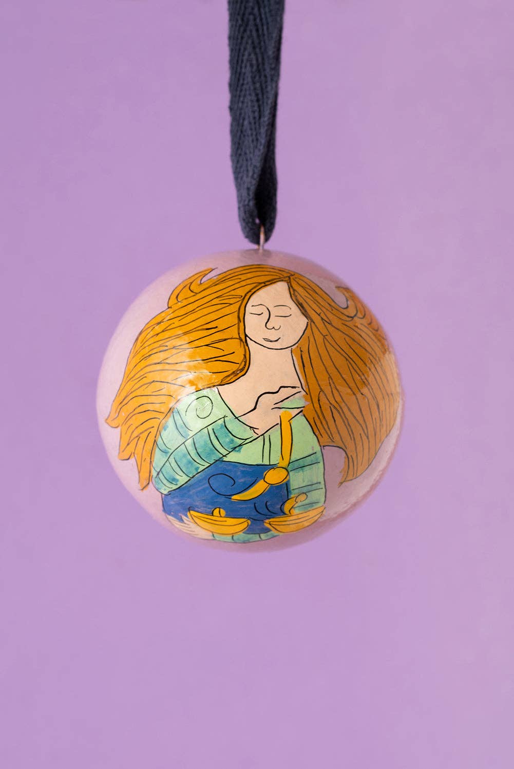 Libra zodiac papier mache bauble hand painted by Fiona Balfour