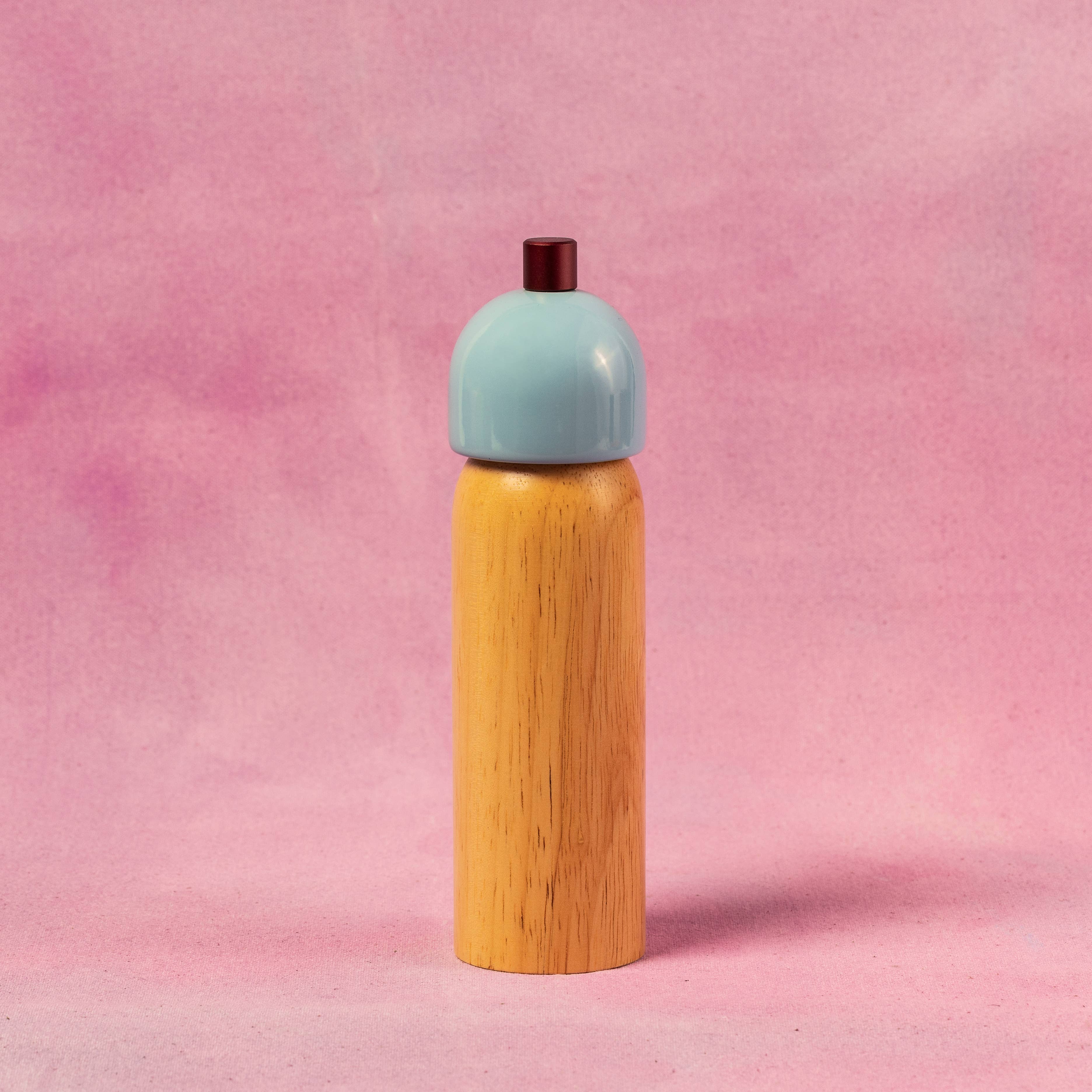 Salt and pepper grinders shown in medium and large sizes