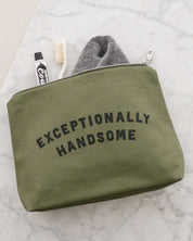Green pouch with 'Exceptionally Handsome' text on a marble surface