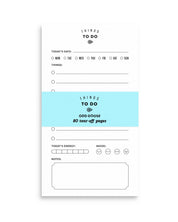 To-do list pad with tear-off pages on a white background