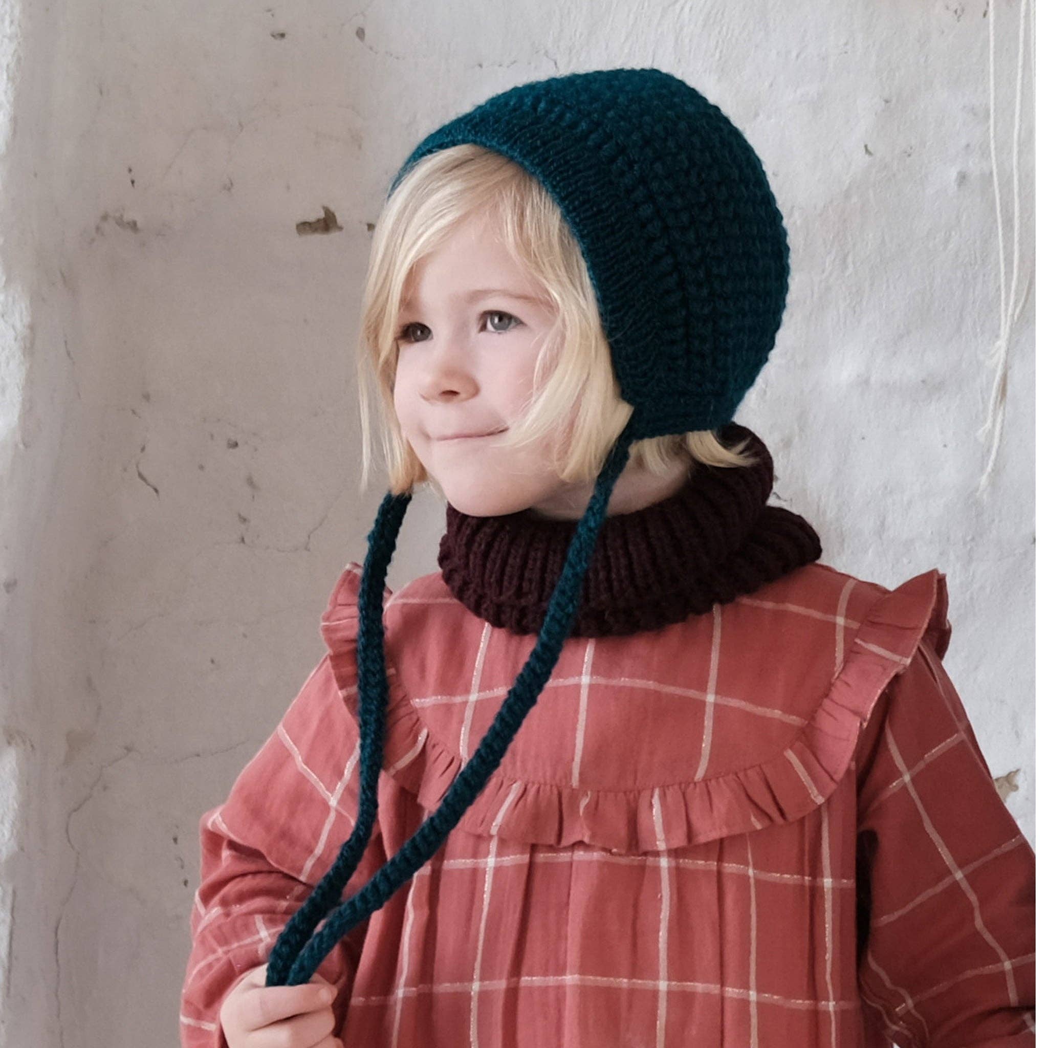 Crochet bonnet by EKA, further view