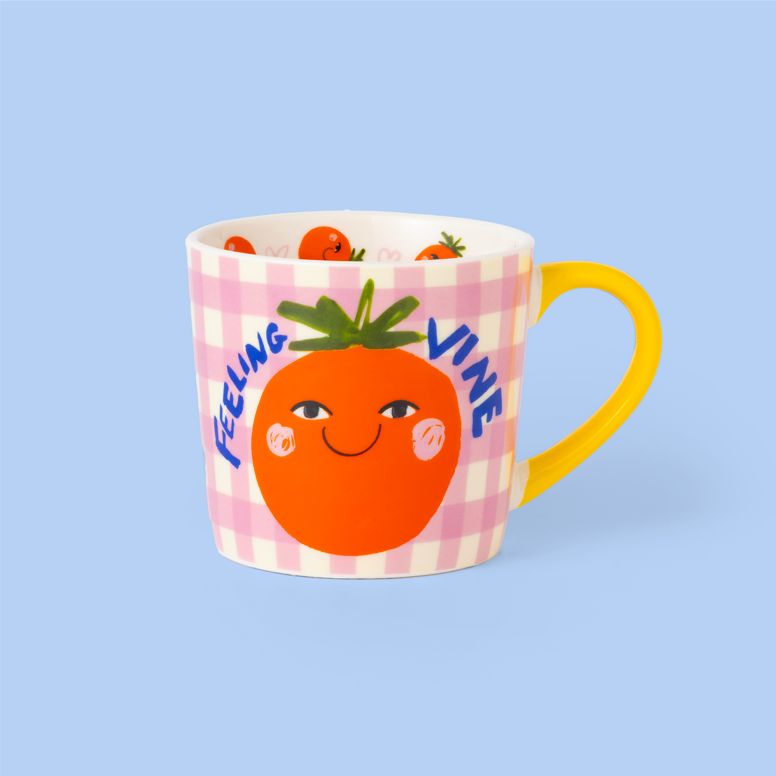 Feeling Vine mug by Eleanor Bowmer with smiling tomato design