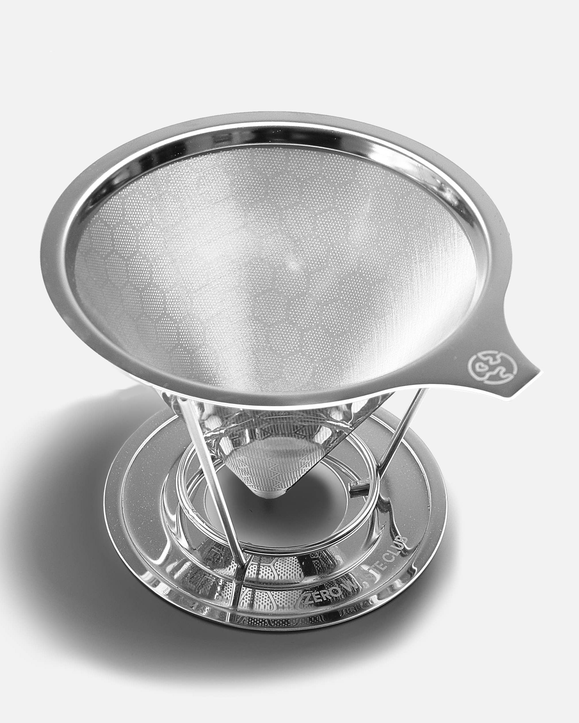 Stainless steel coffee infuser on a light gray background