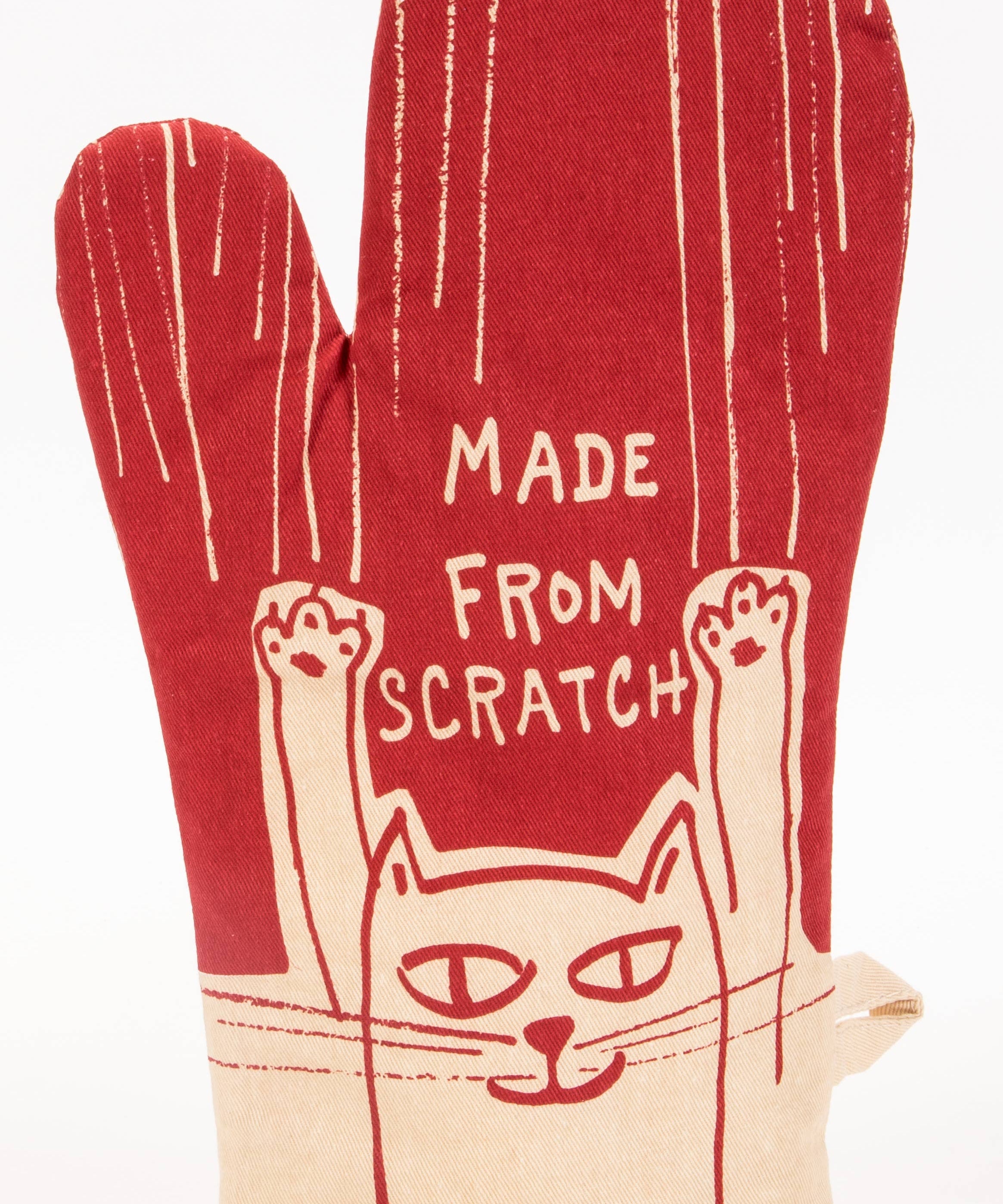 Red oven mitt with a cat design and text 'Made from Scratch' on a white background