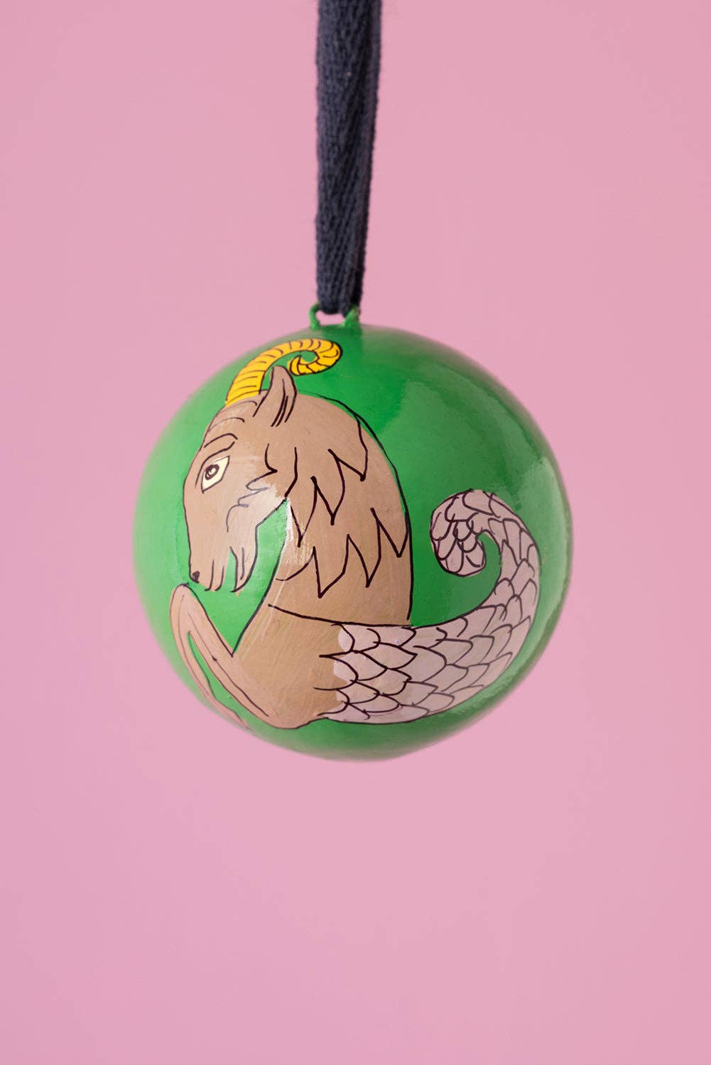 Capricorn zodiac papier mache bauble hand painted by Fiona Balfour