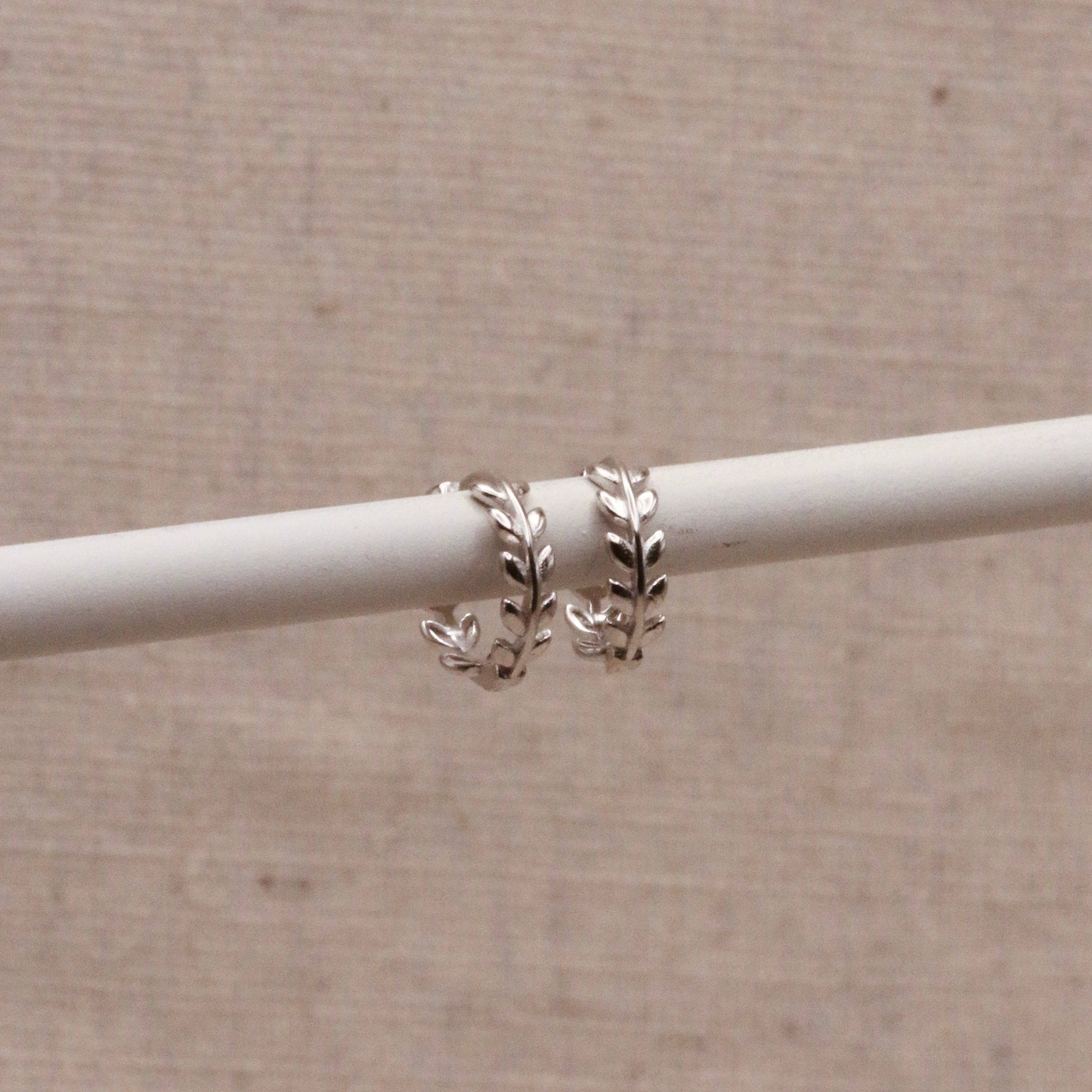 Single Silver Laurel Huggie Hoop by Little Nell, further view