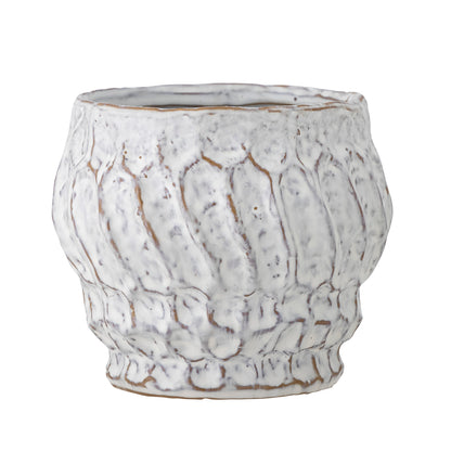 The Cami Flowerpot by Bloomingville is made of stoneware in white with an abstract structure
