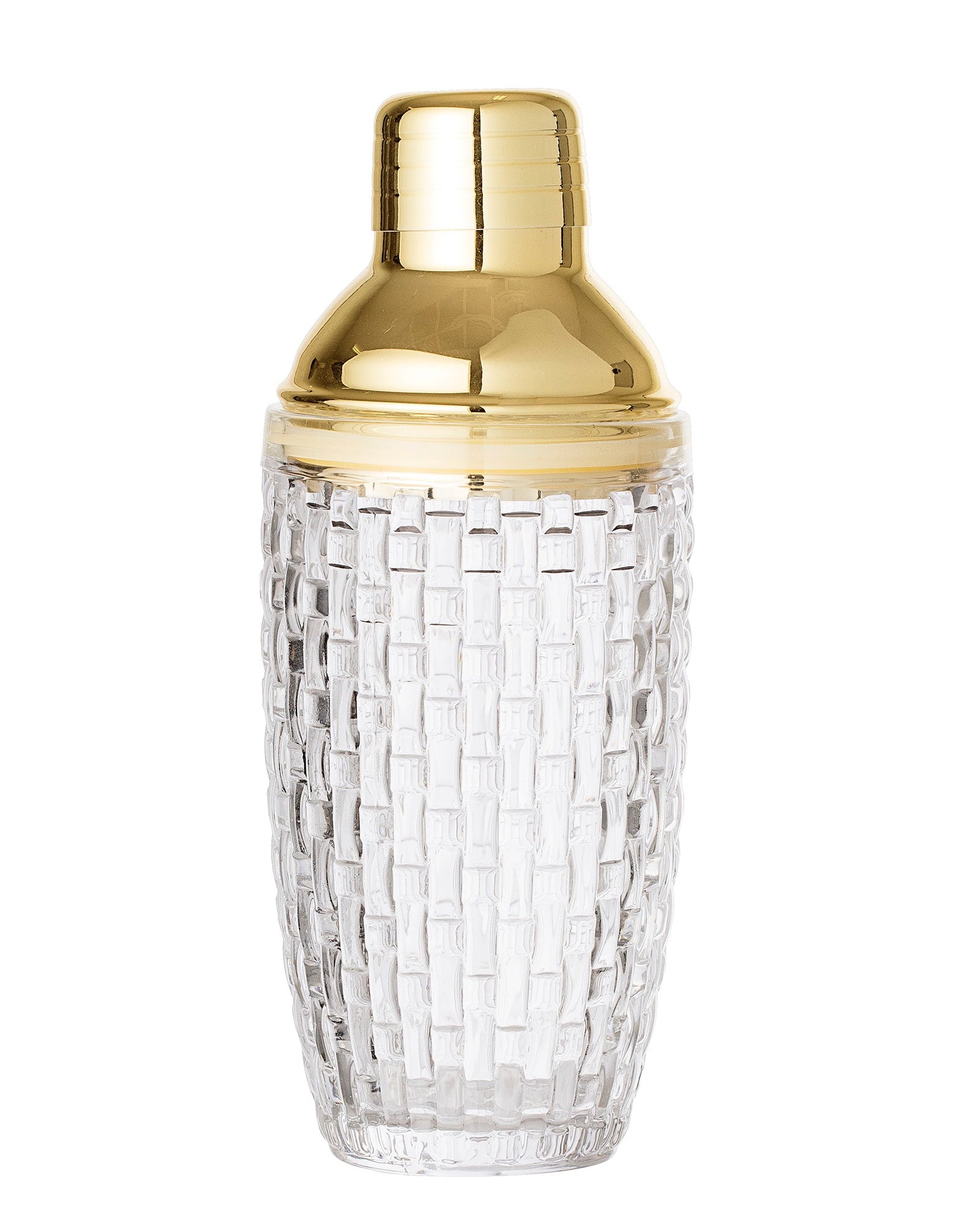 Clear glass cocktail shaker with gold lid on a white background
