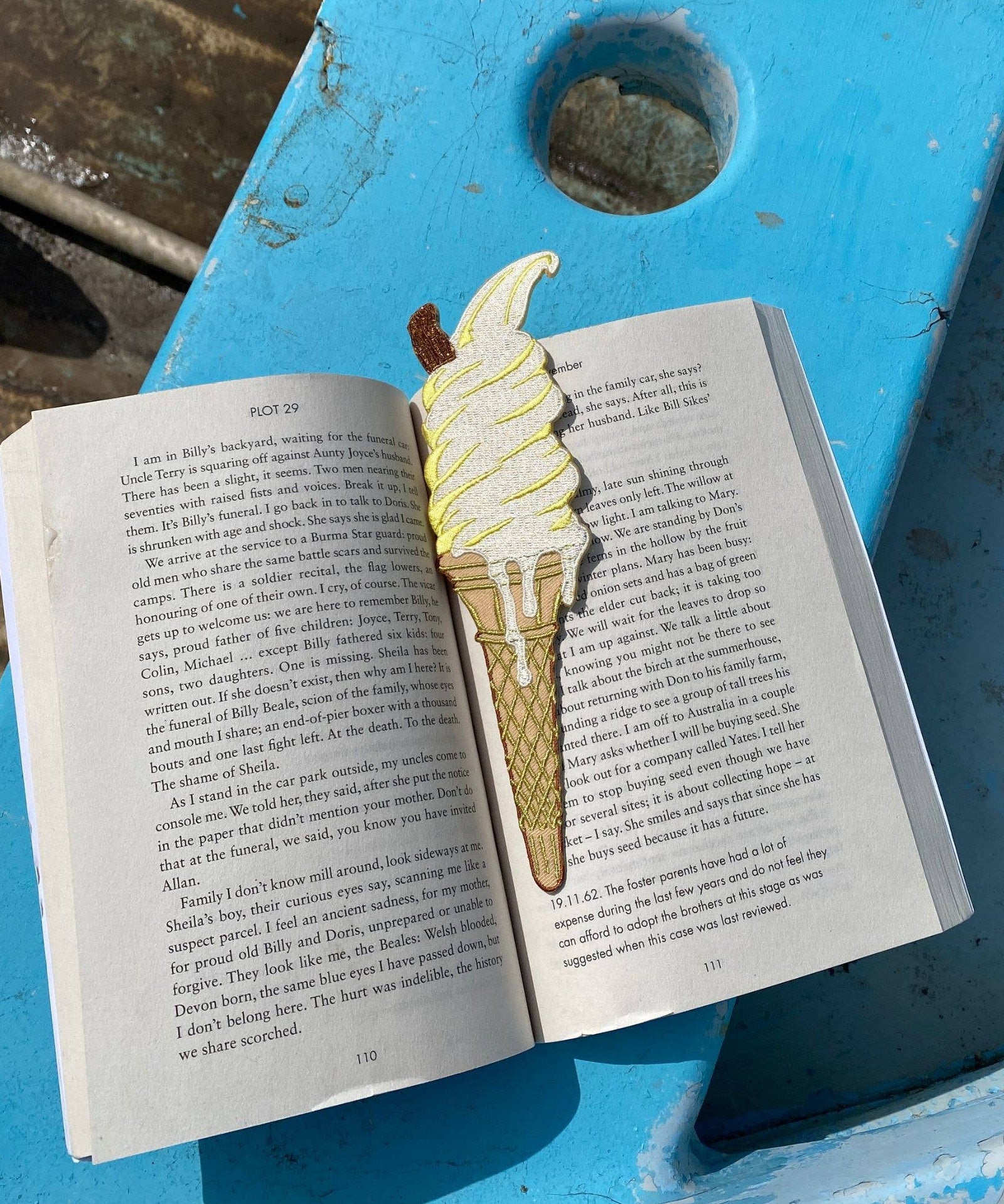 Petra Boase embroidered ice cream fabric bookmark on neutral background