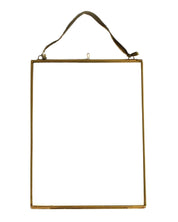 Gold rectangular frame with a strap on a white background