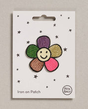 Petra Boase happy flower iron-on embroidered patch on neutral background