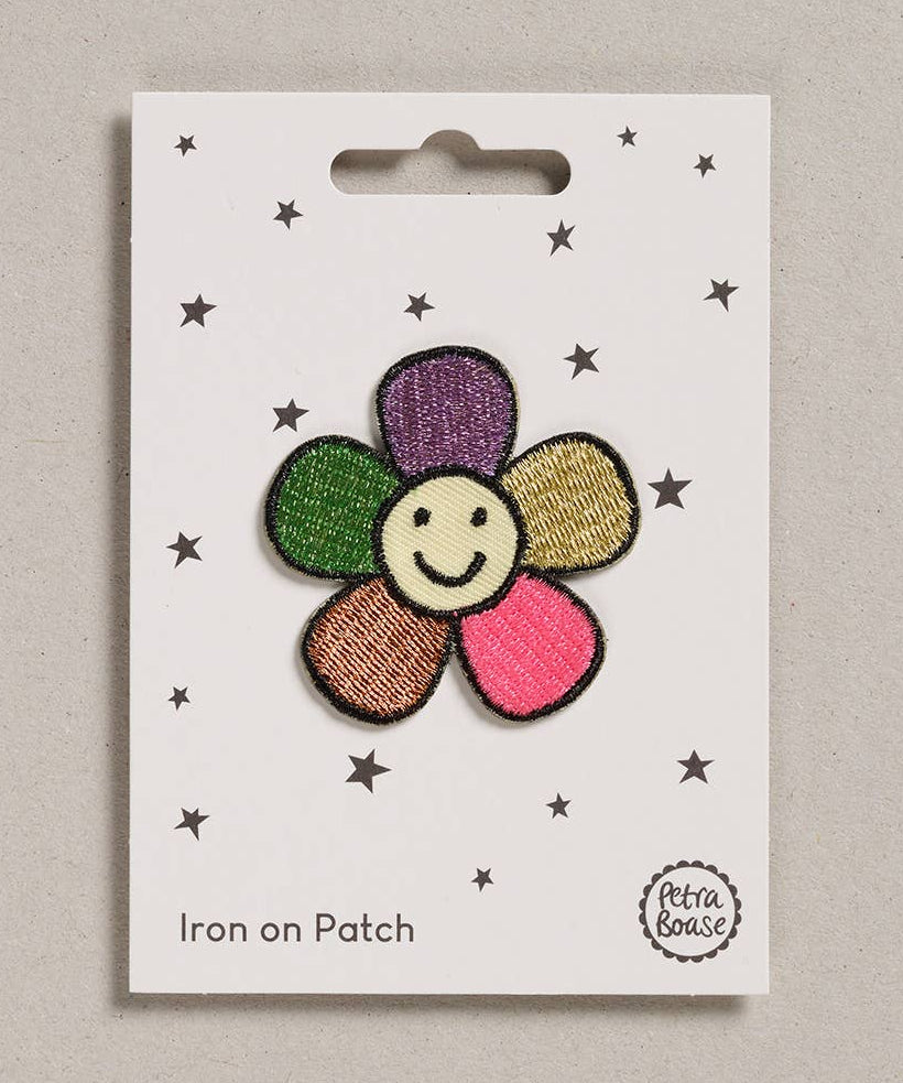 Petra Boase happy flower iron-on embroidered patch on neutral background