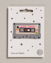 Petra Boase Love Songs cassette tape iron-on embroidered patch on neutral background