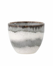 Ceramic pot with gray and white gradient on a white background