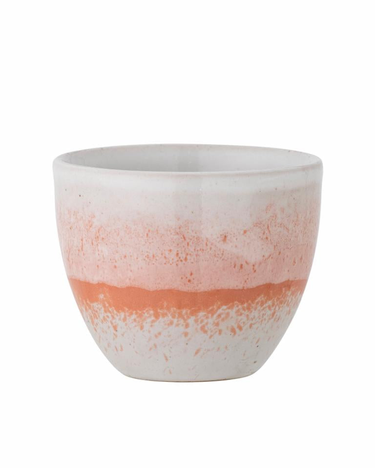 Ceramic pot with a two-tone design on a white background
