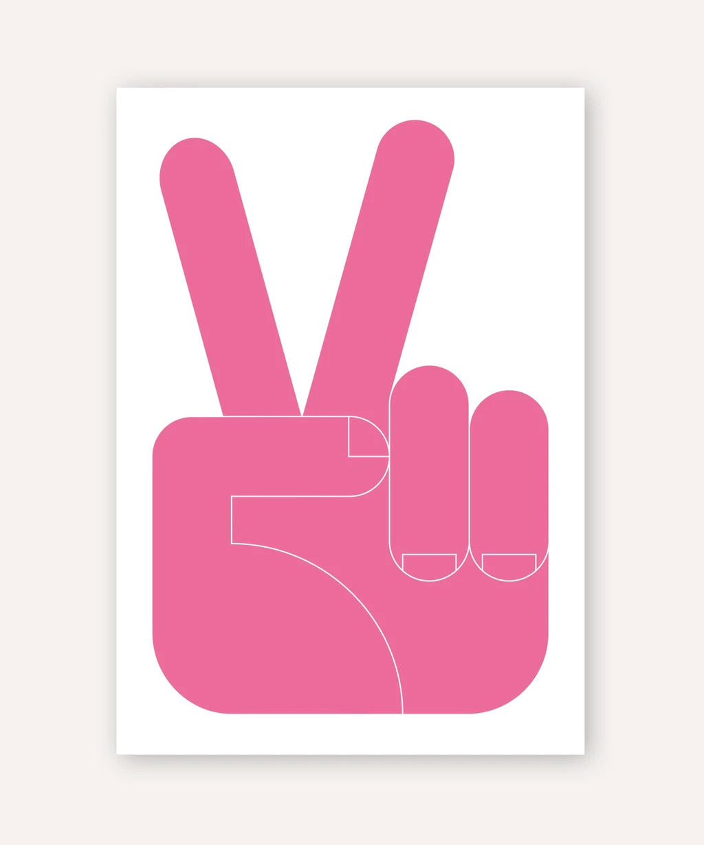 A minimalist art print featuring a pink hand making a peace sign on a white rectangular poster, centered against a light beige background.
