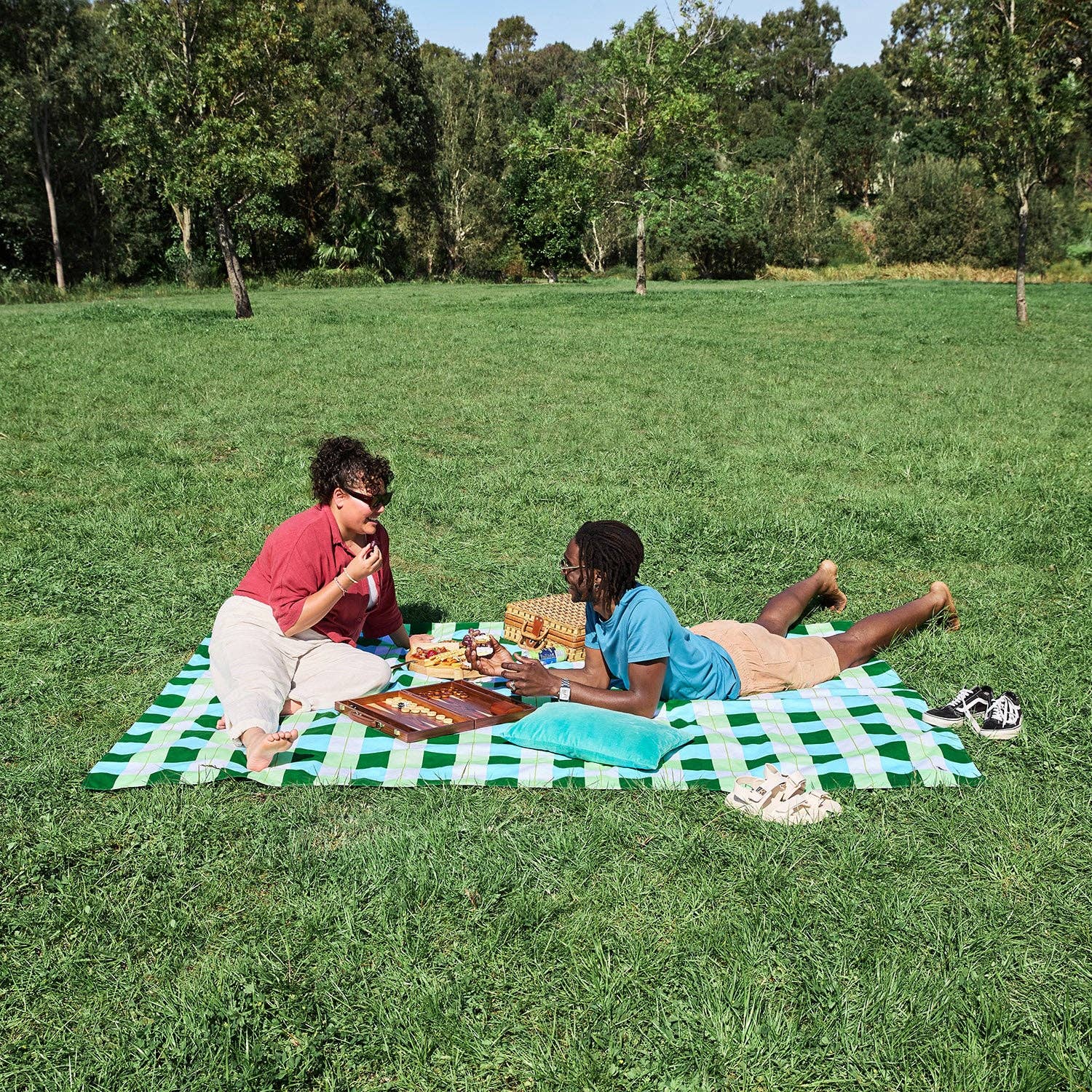 Dock & Bay picnic blanket, Apple Tart print, folded with carry pouch