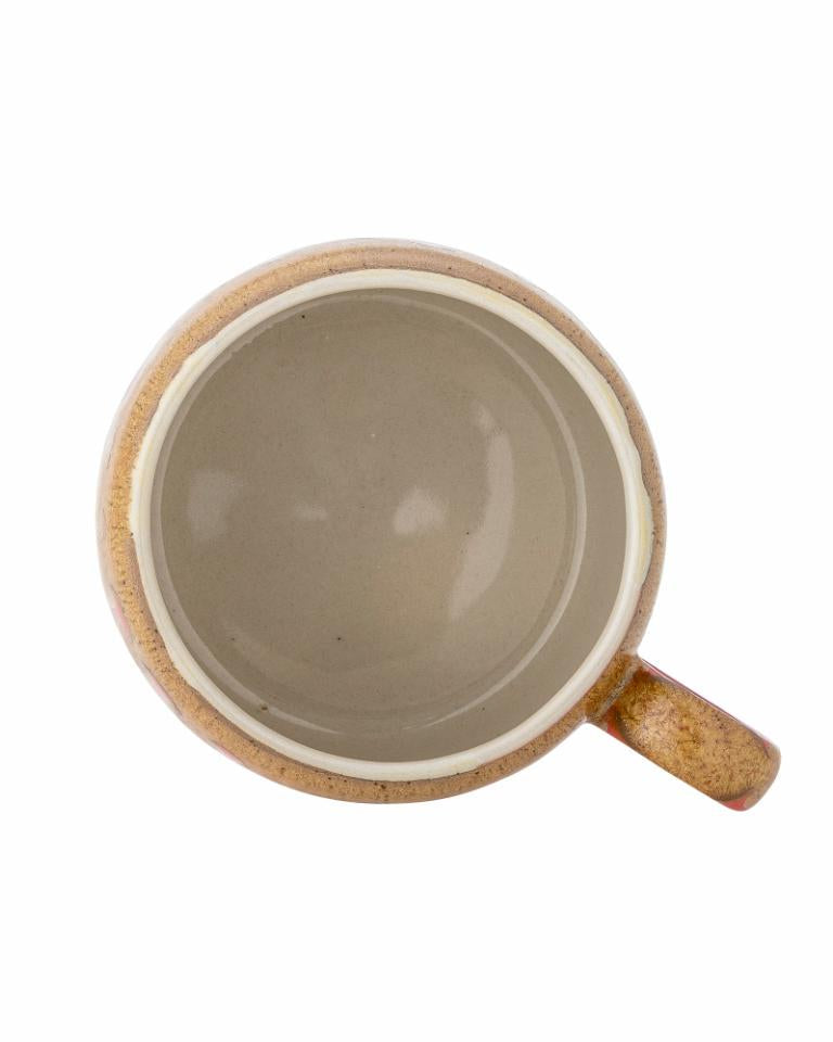 Ceramic mug with a handle on a white background