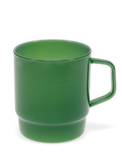 Green mug on a white background