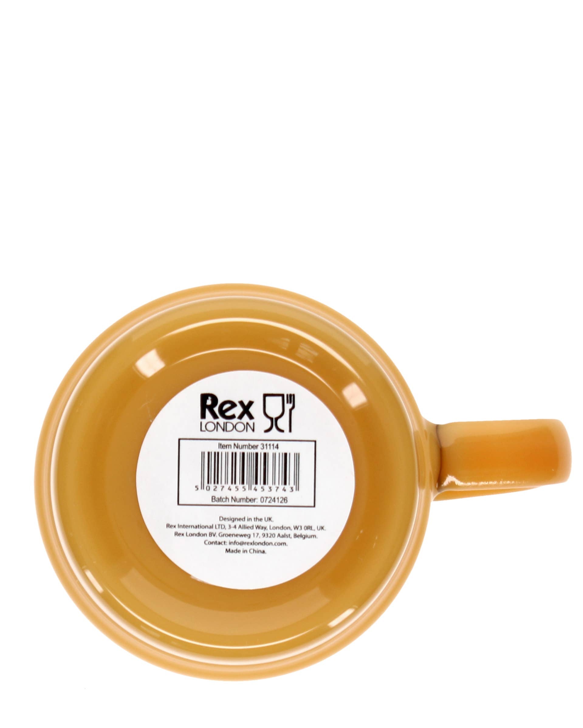 Yellow mug with a label on a white background