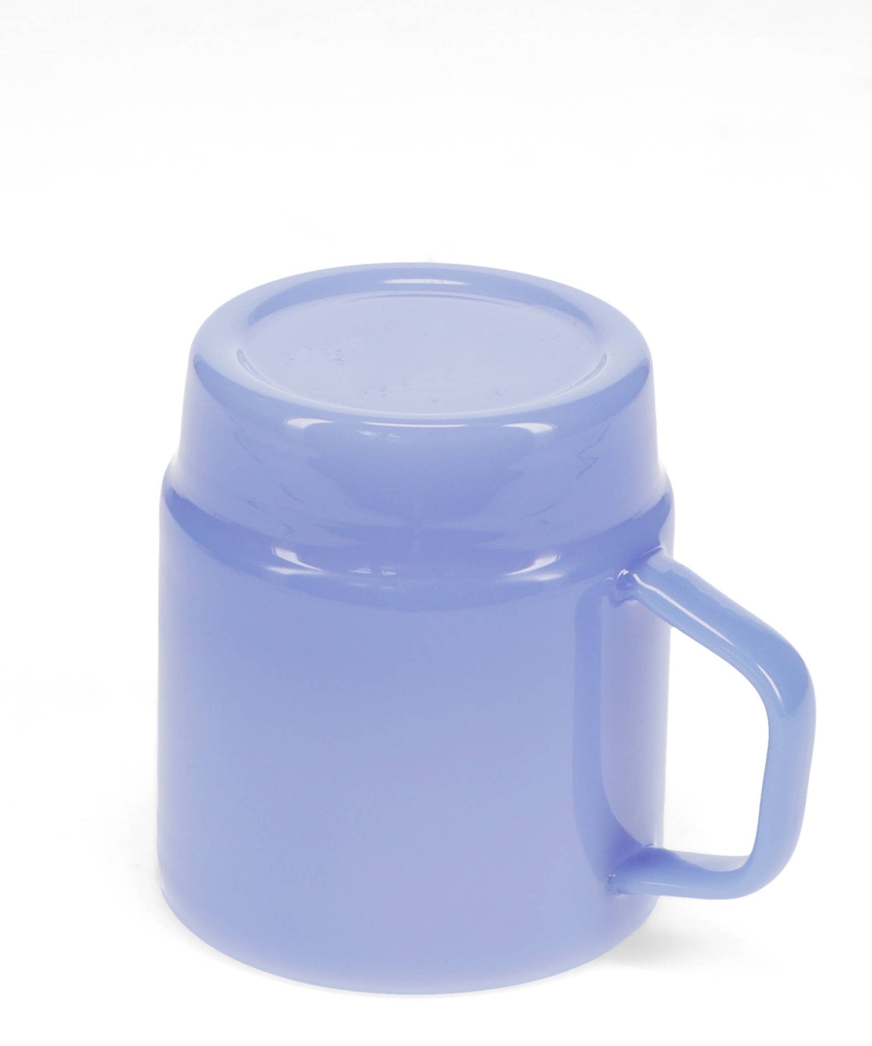 Light blue mug with a lid on a white background