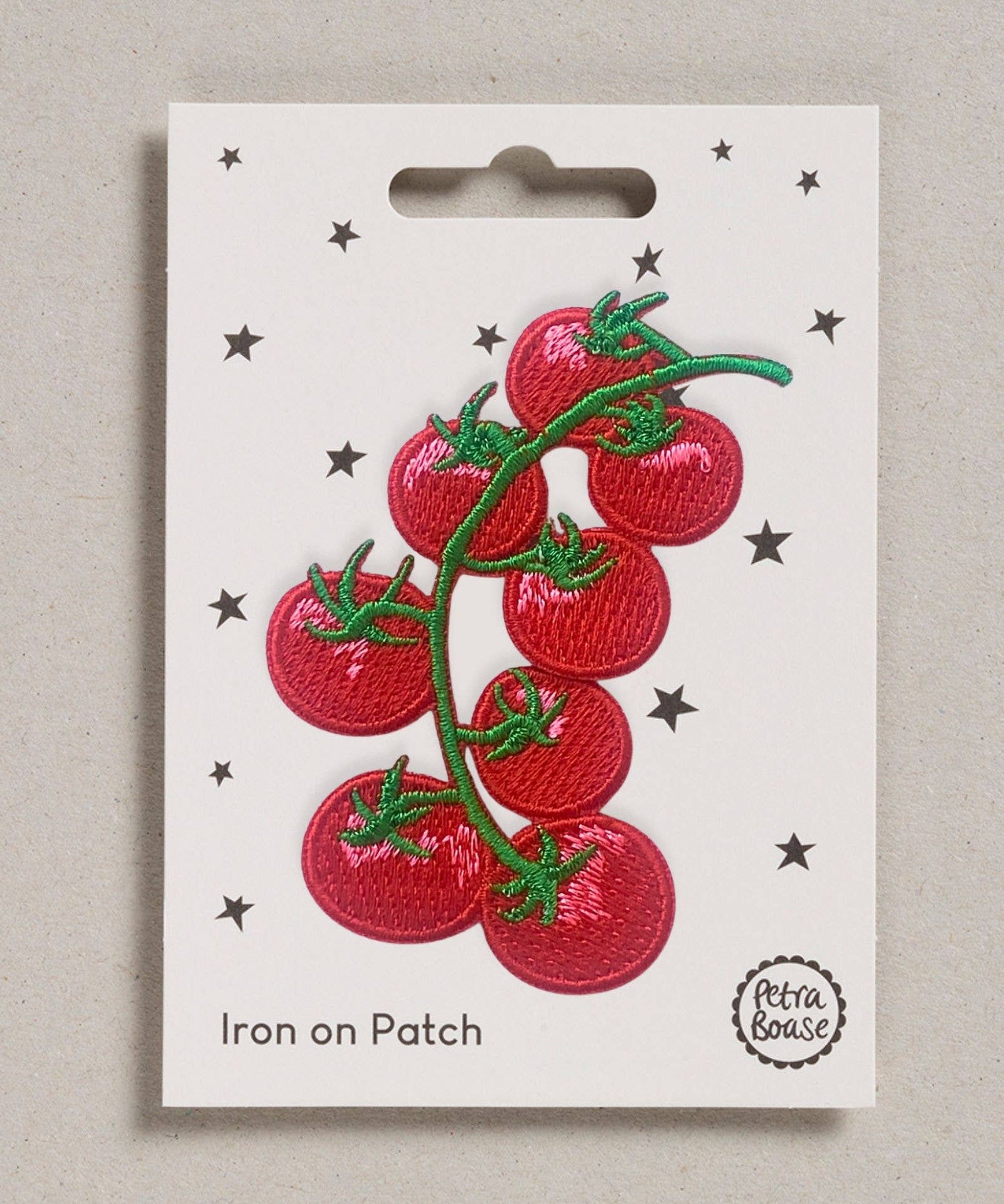 Petra Boase tomato iron-on embroidered patch on neutral background