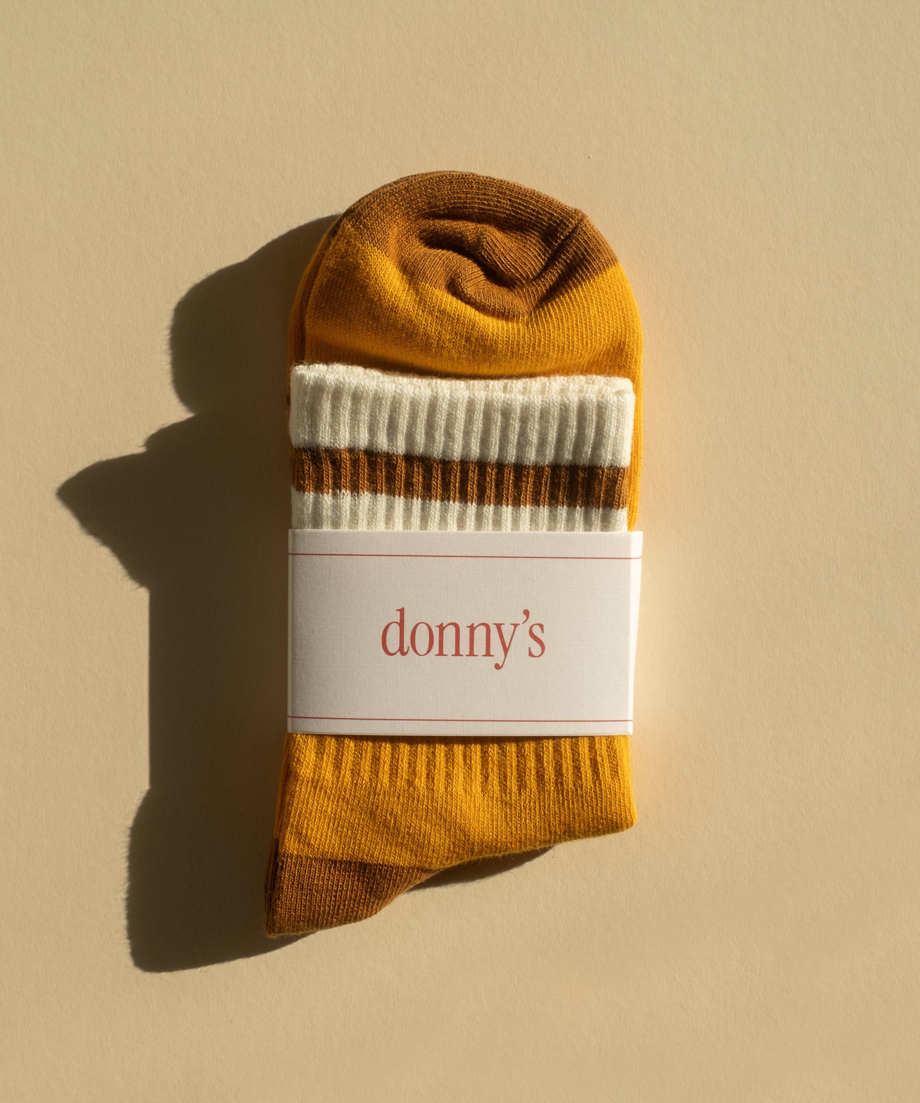 Folded donny's marigold sock in their packaging