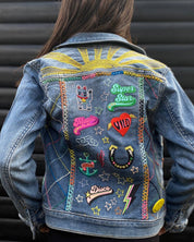 multiple patches on a denim jacket