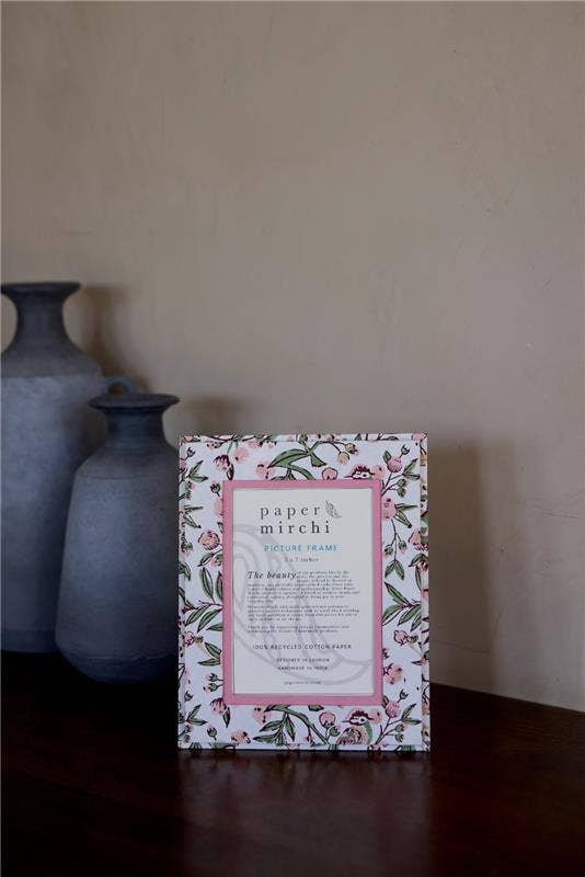Floral patterned picture frame made from recycled cotton paper, on a white background