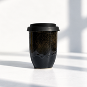 Reusable ceramic coffee cup in Manhattan, further view