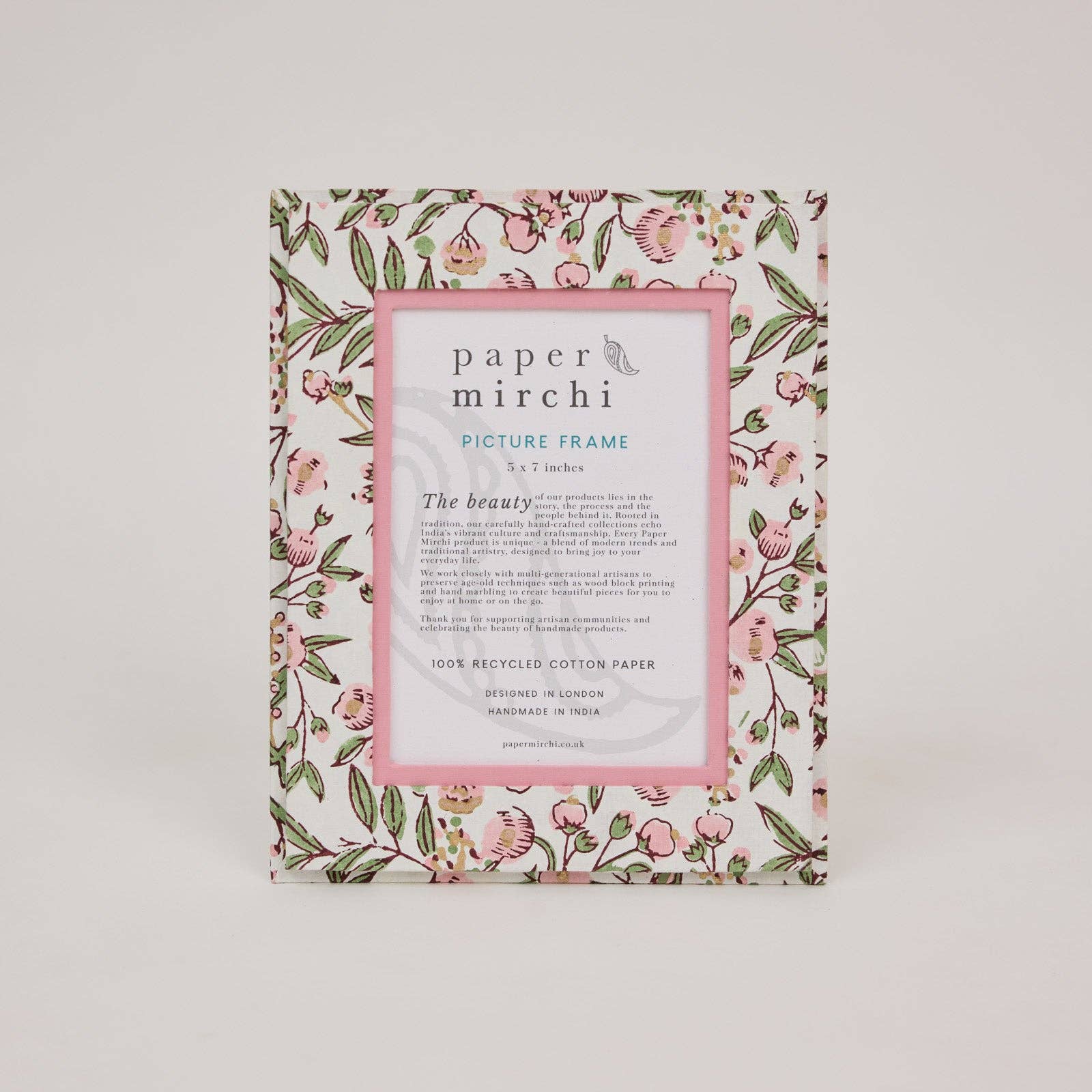 Floral patterned picture frame made from recycled cotton paper, on a white background