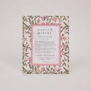 Floral patterned picture frame made from recycled cotton paper, on a white background
