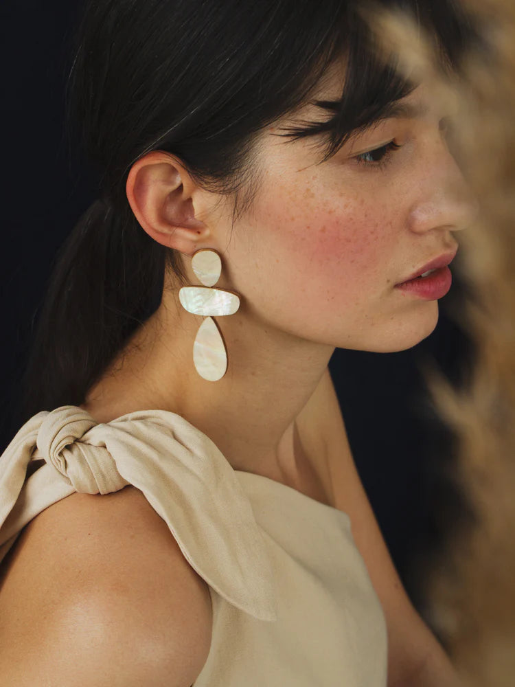 Th Every Space Ana earrings in cream mother of pearl veneer, wood and sterling silver by Wolf & Moon