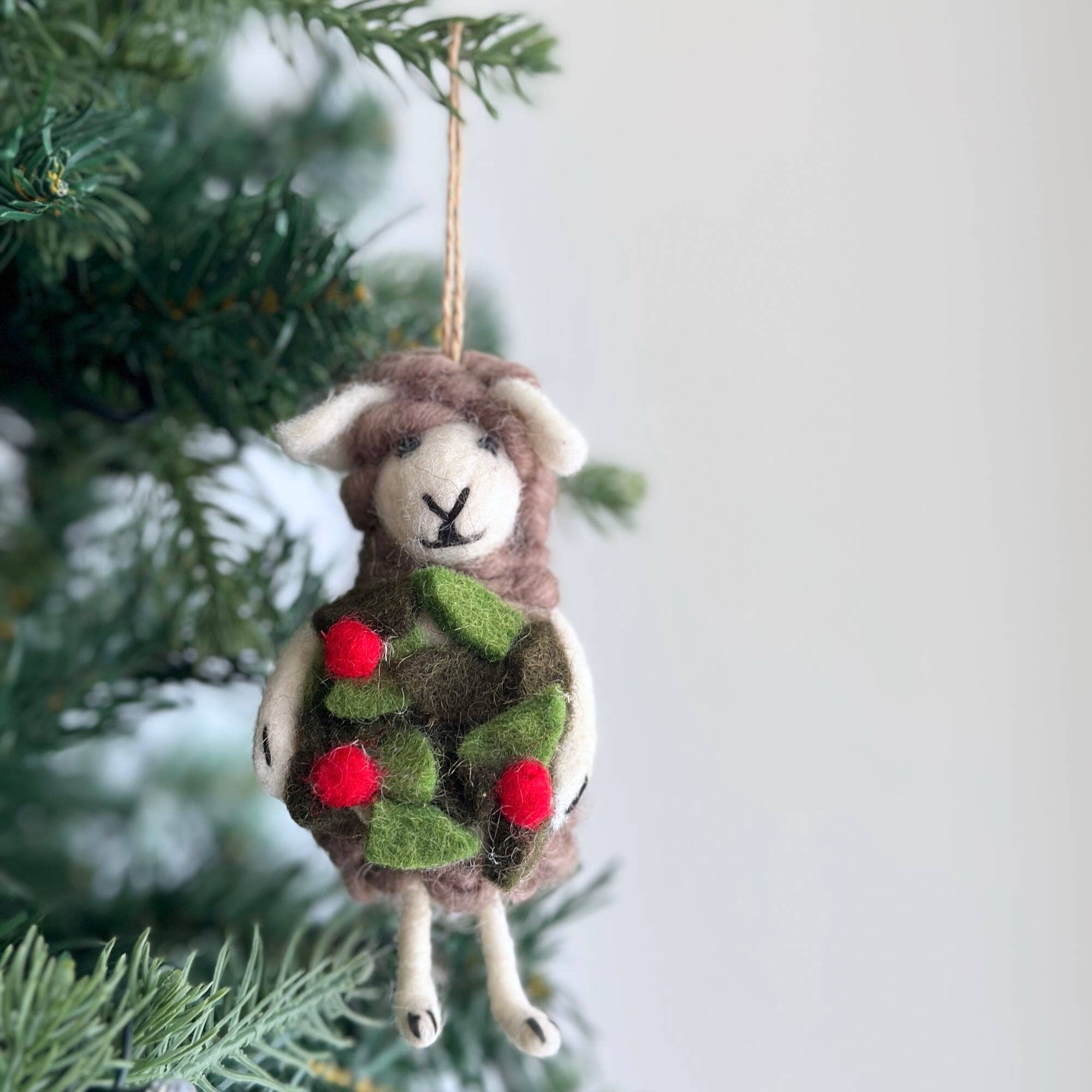 Sheep Holding Santa Ornament
