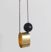 Brushed Brass Oval+Onyx long necklace
