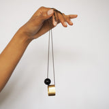 Brushed Brass Oval+Onyx long necklace