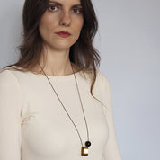 Brushed Brass Oval+Onyx long necklace