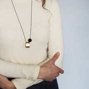Brushed Brass Oval+Onyx long necklace