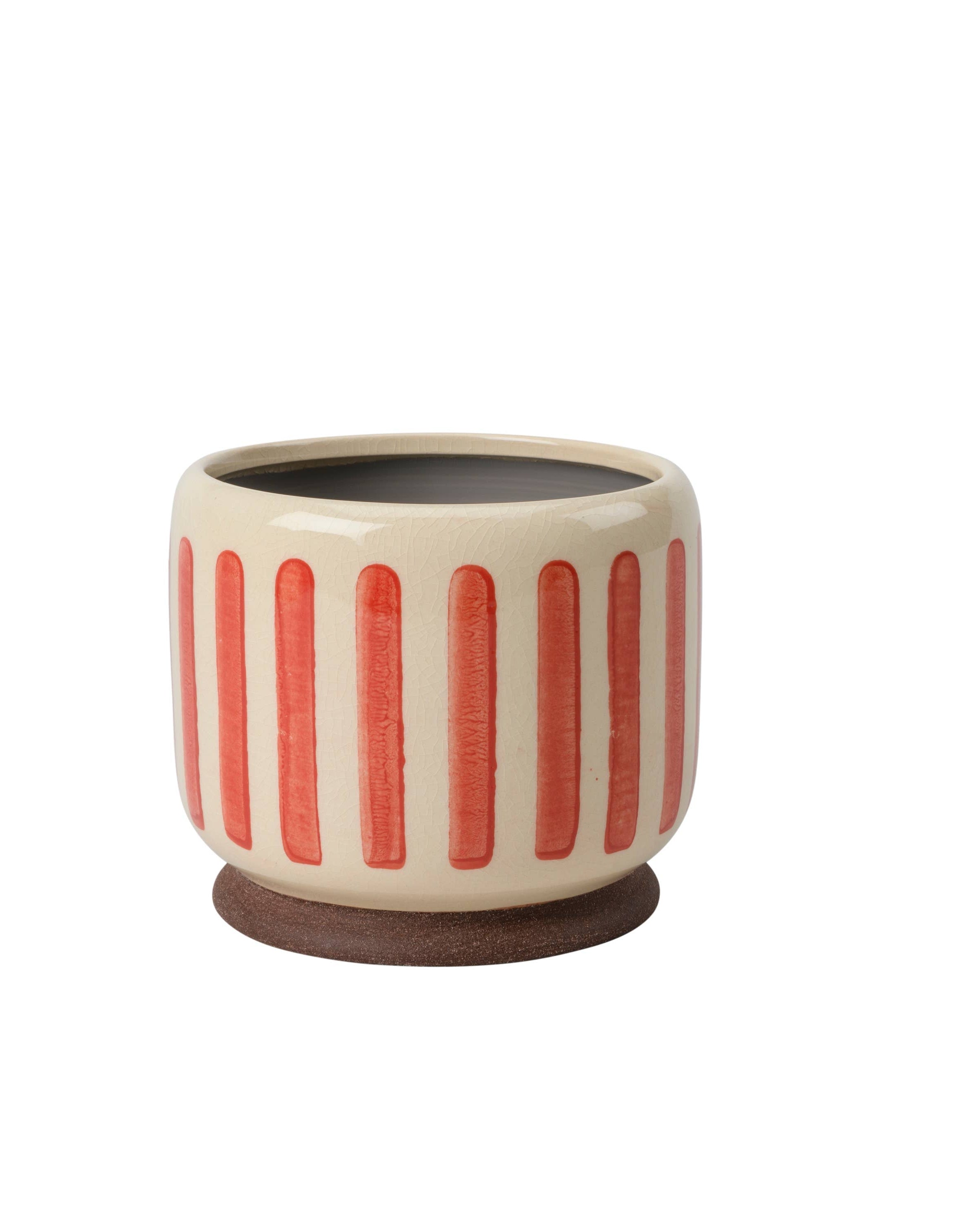 Ceramic planter with red vertical stripes on a white background