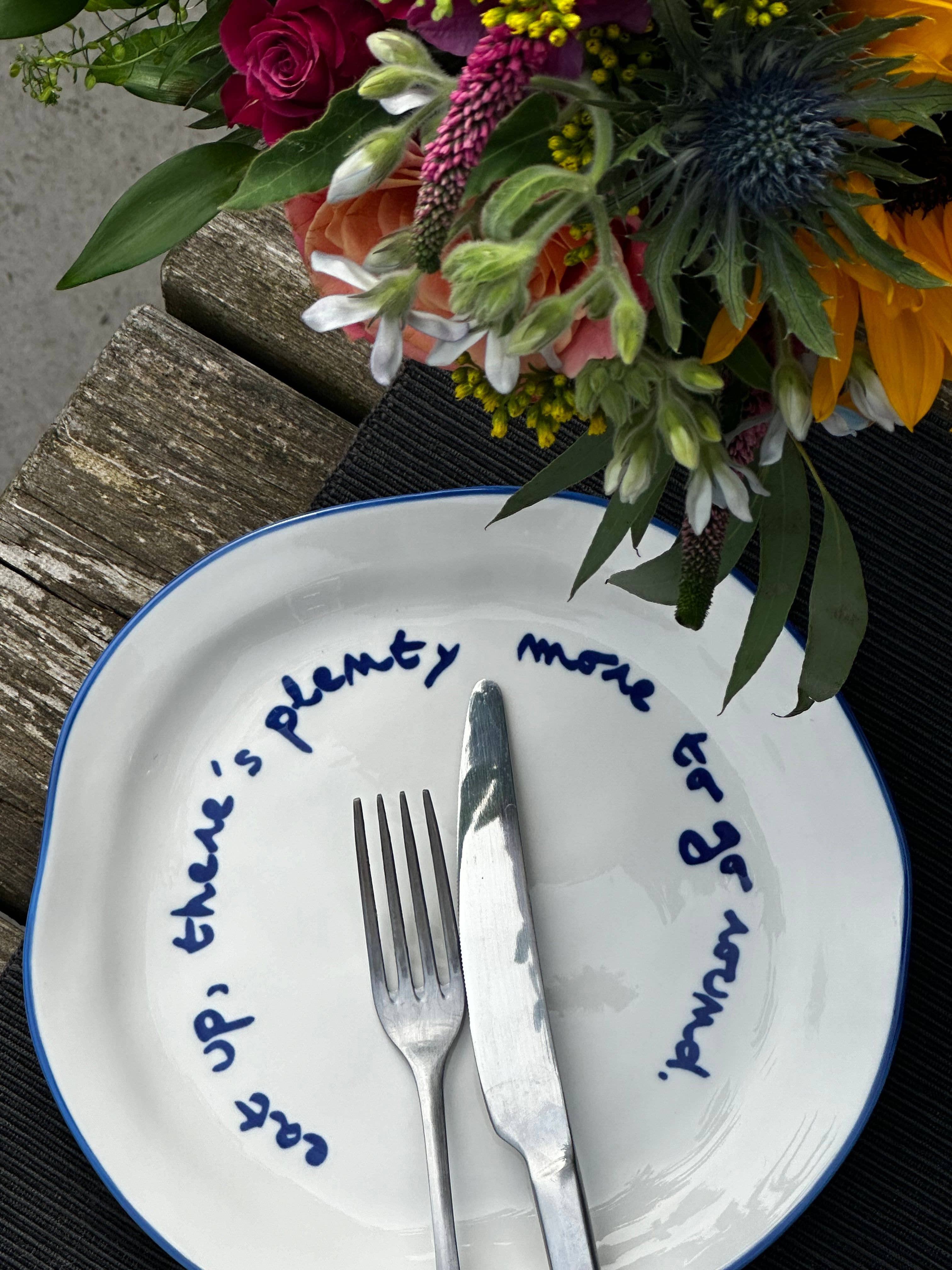 'eat up there's plenty more to go around' Statement Plate