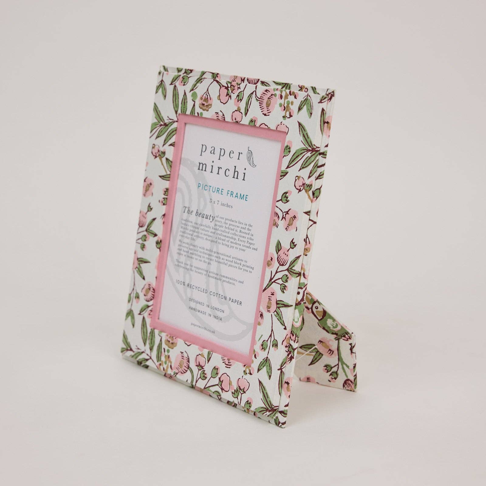 Floral patterned picture frame made from recycled cotton paper, on a white background