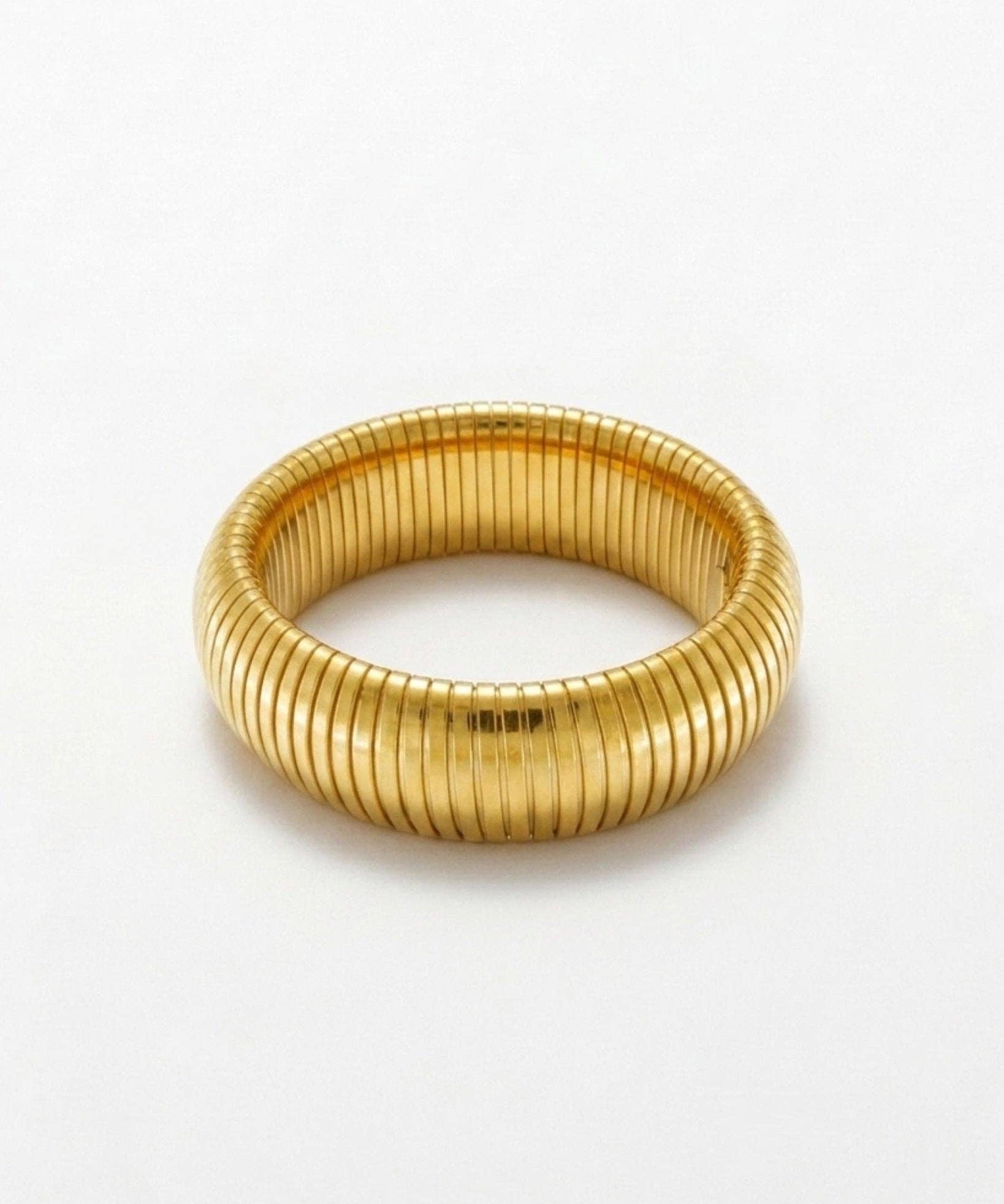 Dansk Copenhagen Courage semi elastic bracelet in waterproof 18k gold plated stainless steel