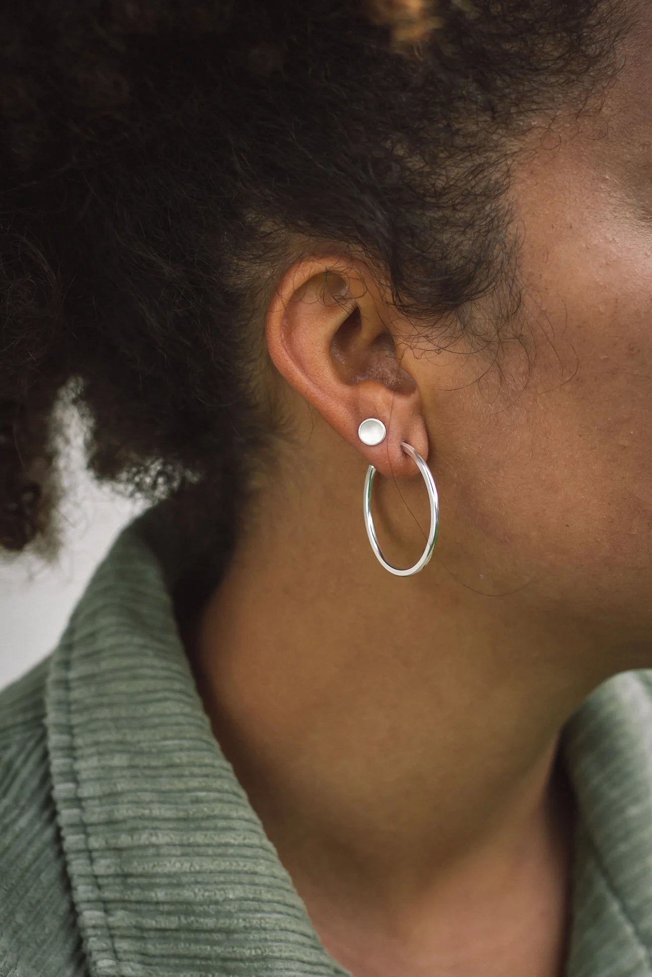The Every Space silver hoop earrings handmade using recycled silver by Clare Elizabeth Kilgour, with sterling silver pins and scrolls