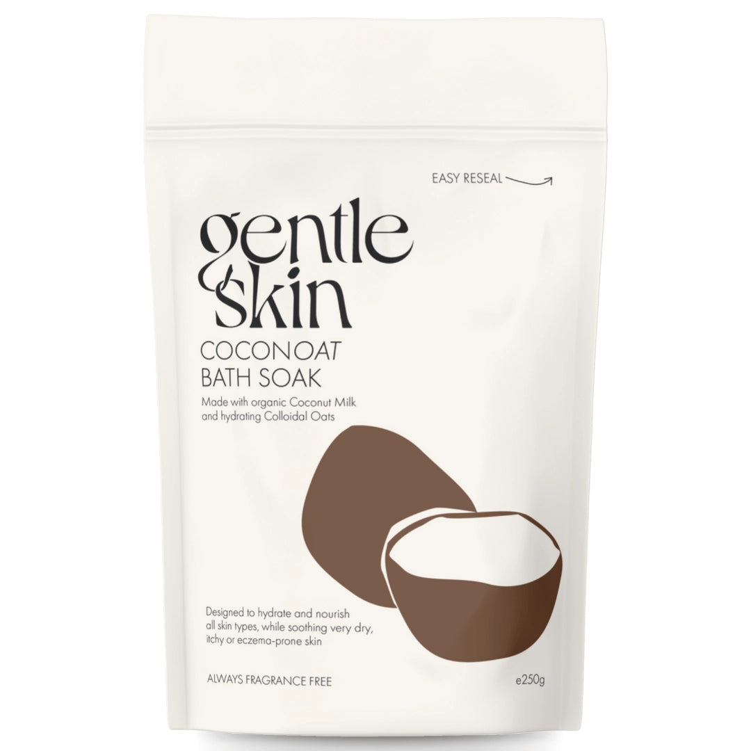 Gentle Skin Coconoat bath soak with oat and coconut milk powder, in a cream pouch on a white background