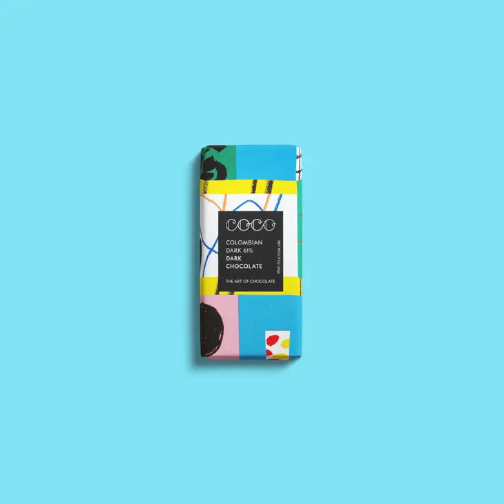 The 20g Colombian Dark 60% mini chocolate bar, by Coco Chocolatier, features artwork by&nbsp;Atelier Bingo and is vegetarian, vegan, gluten free, dairy free, and Palm Oil free