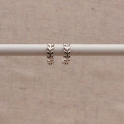 Single Silver Laurel Huggie Hoop by Little Nell, further view