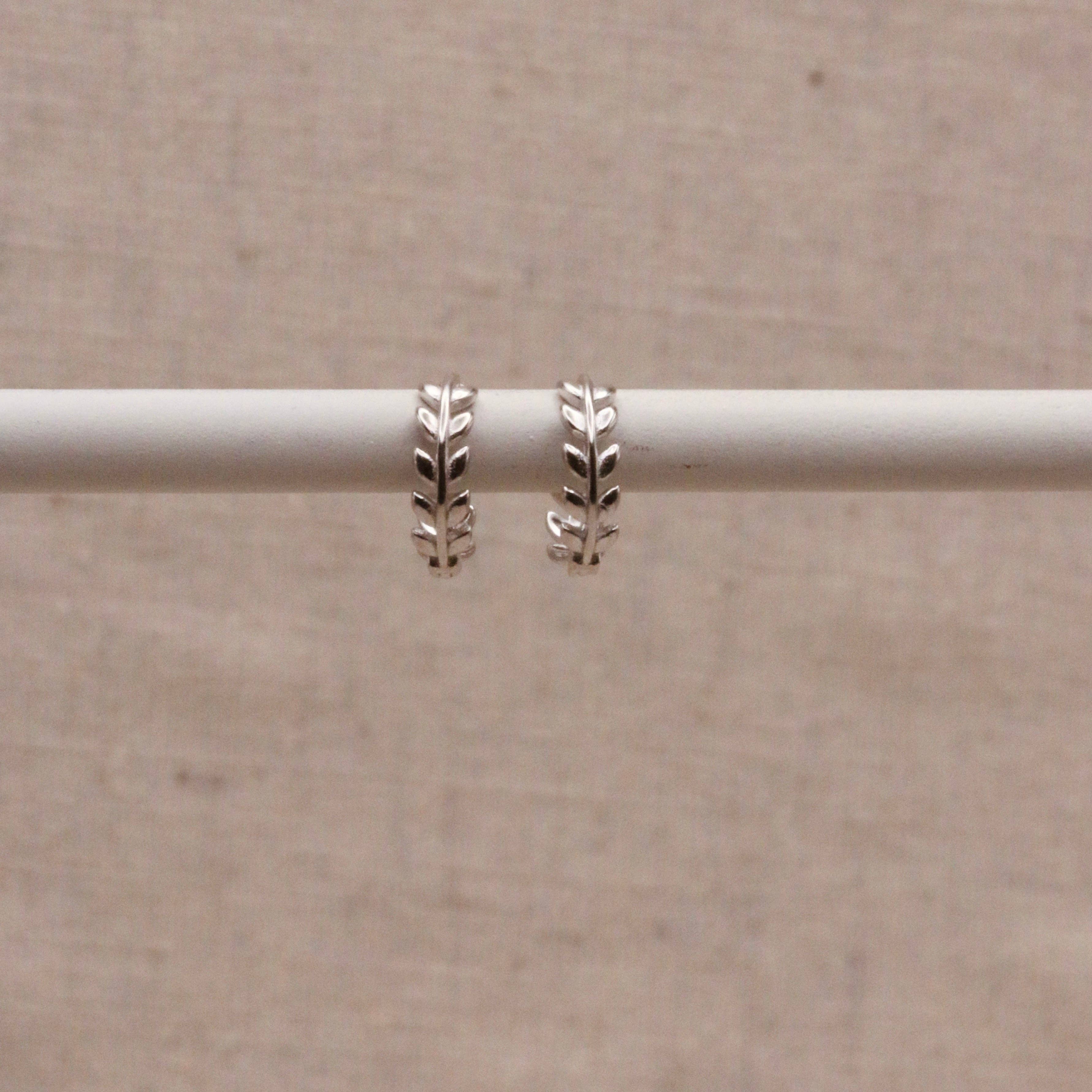 Single Silver Laurel Huggie Hoop by Little Nell, further view